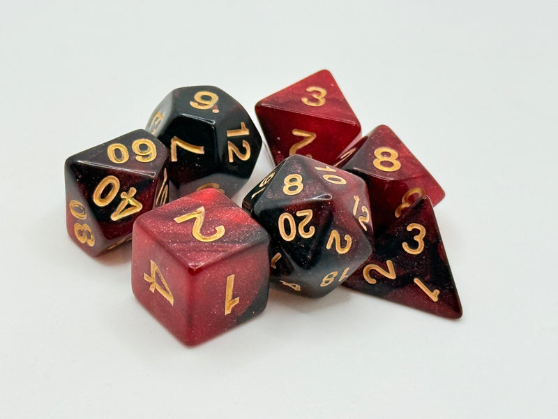 Taps Games: Sparkles 7-Die Set Red Black / Gold "Firestorm" Dice & Gaming Accessories Taps Imports