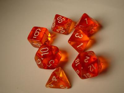 Chessex: Orange/White Translucent 7-Die Set Dice & Gaming Accessories Chessex